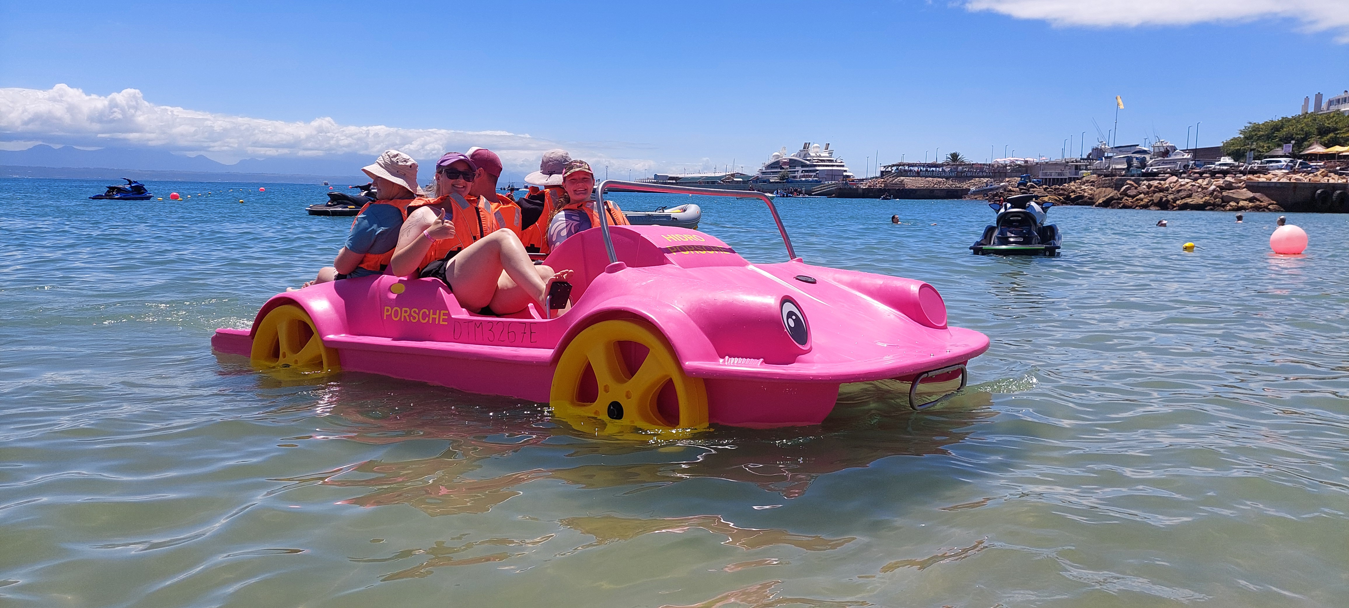 Beach scene with pedal boats